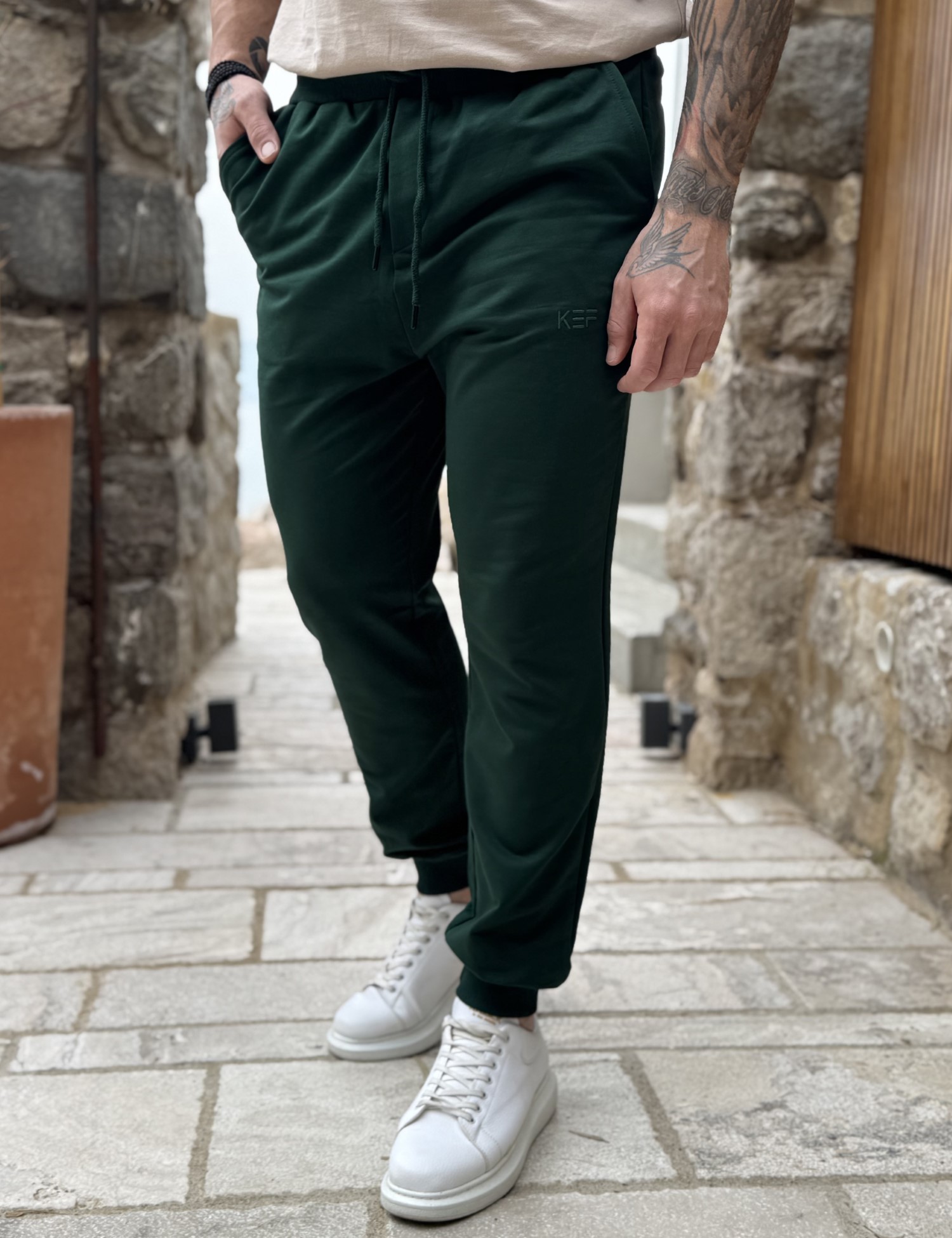 Ανδρική πράσινη αθλητική φόρμα με λάστιχο KEF2618